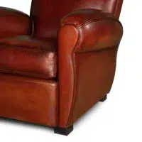 Cognac Petit Moustache leather club chair, zoom armrest