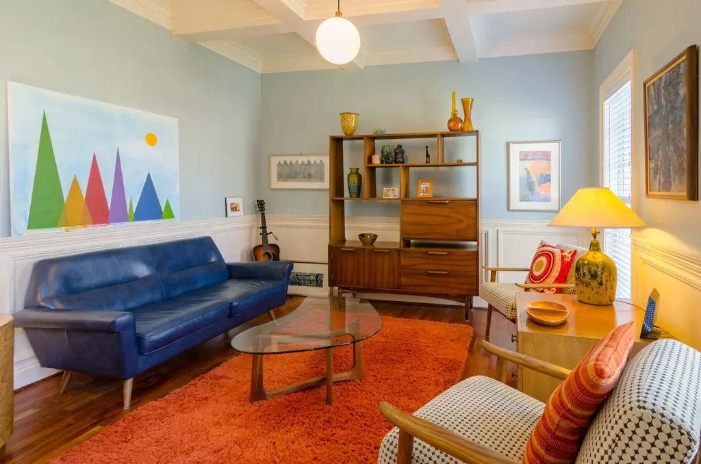 Living room with vintage decoration, colours, furniture and colourful objects from the 70s